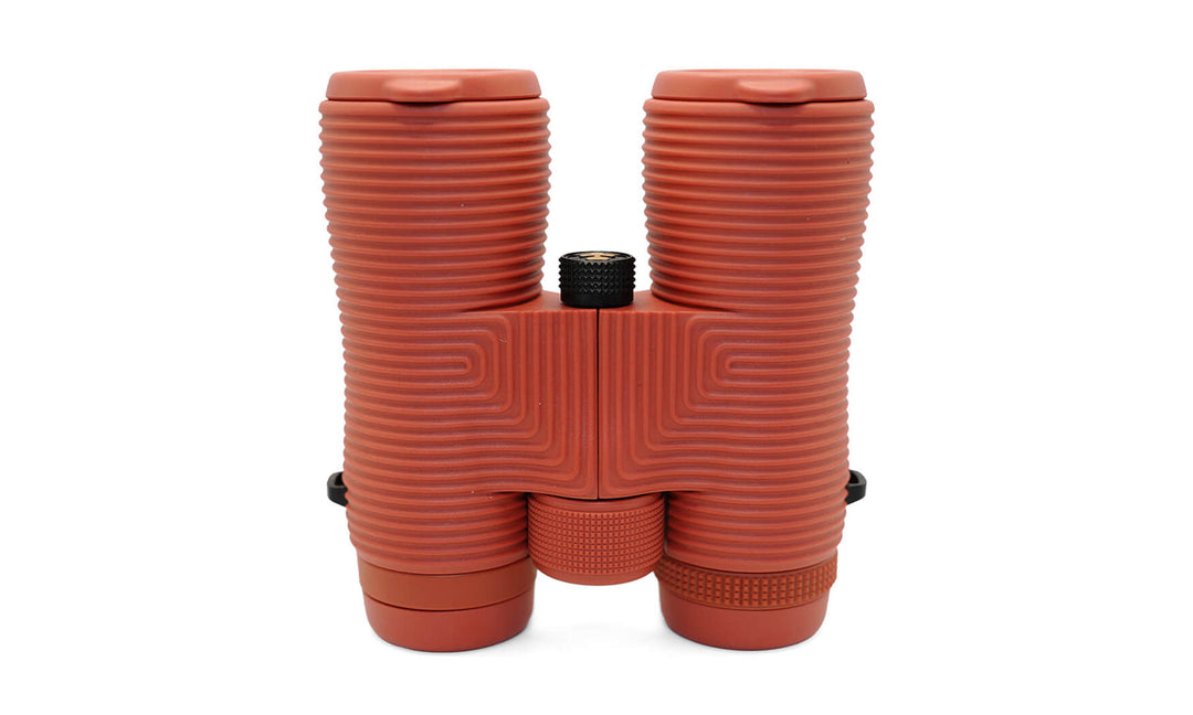 Nocs Provisions Field Issue 10x42 binoculars in Brick Red - standing view
