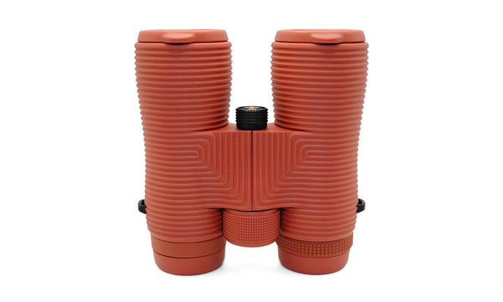 Nocs Provisions Field Issue 10x42 binoculars in Brick Red - standing view